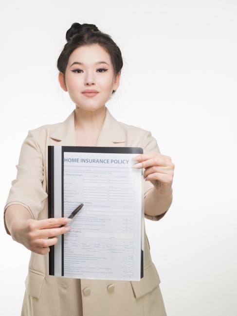 pexels photo 7736070 7736070 Professional woman showcasing a home insurance policy document with confidence and clarity.